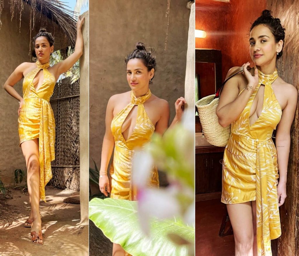 aisha sharma posing in braless short yellow dress