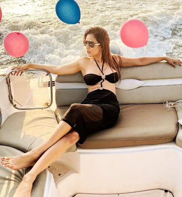 nia sharma hot bralette picture in a boat