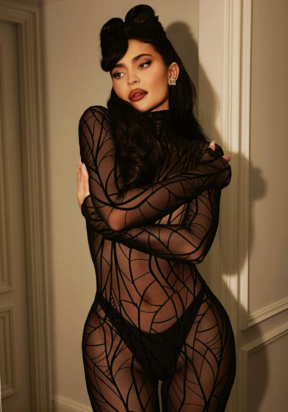 kylie jenner sexy look in black thong and see through catsuit