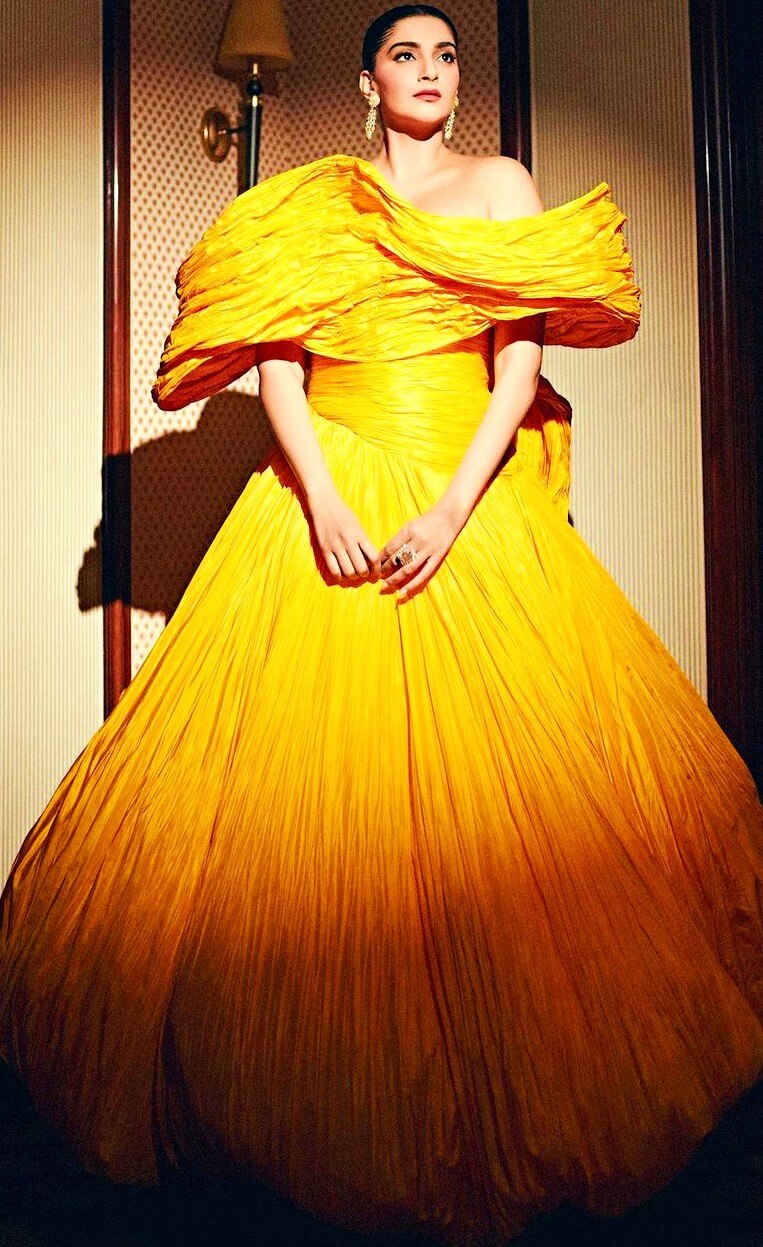 sonam kapoor in a sara mrad designed dramatic marigold yellow gown 