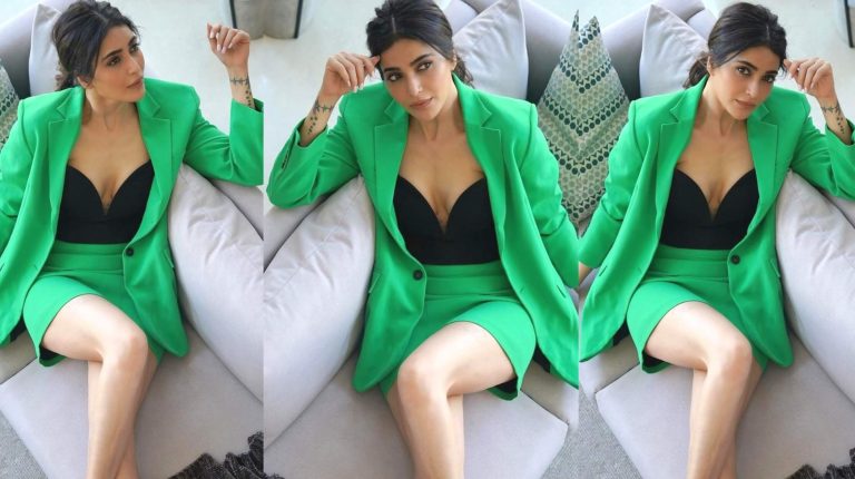 karishma tanna in a hot clasic green skirt suit pics