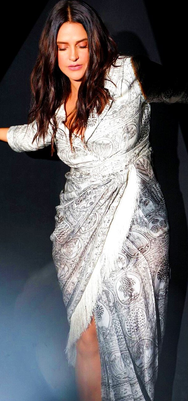sensual look of neha dhupia in a silver silk gown

