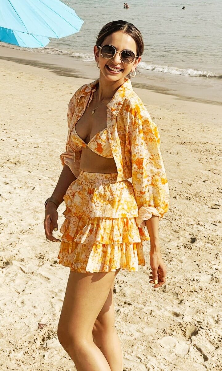 rakul preet singh braless sexy photo in floral beach dress